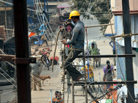 Labour work Road side Electrical post on February  13, 2018 in Kolkata City , India. (