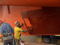 Painter paint on a ship at Keraniganj, Dhaka, Bangladesh on 18 February 2018. When it comes to shipping, Bangladesh is known mostly as a shi...