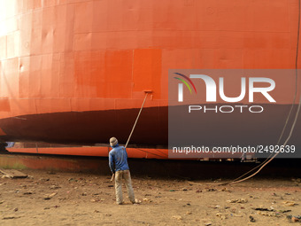 A Painter paint on a long ship at Keraniganj, Dhaka, Bangladesh on 18 February 2018. When it comes to shipping, Bangladesh is known mostly a...