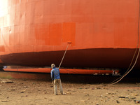 A Painter paint on a long ship at Keraniganj, Dhaka, Bangladesh on 18 February 2018. When it comes to shipping, Bangladesh is known mostly a...