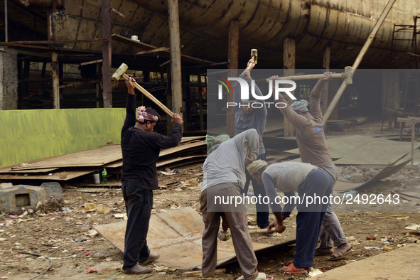 Workers breaking the ship parts with heavy hammer  at Keraniganj, Dhaka, Bangladesh on 18 February 2018. When it comes to shipping, Banglade...