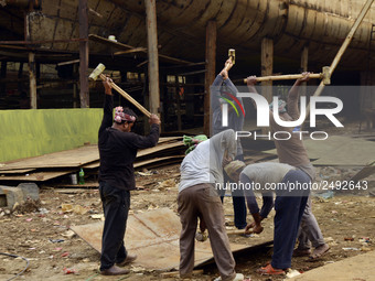 Workers breaking the ship parts with heavy hammer  at Keraniganj, Dhaka, Bangladesh on 18 February 2018. When it comes to shipping, Banglade...