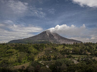 Mount Sinabung seen from Tiga Pancur village, Simpang Empat Distric, Karo, North Sumatera. Indonesia. 15 September 2014. The volcano Mount S...