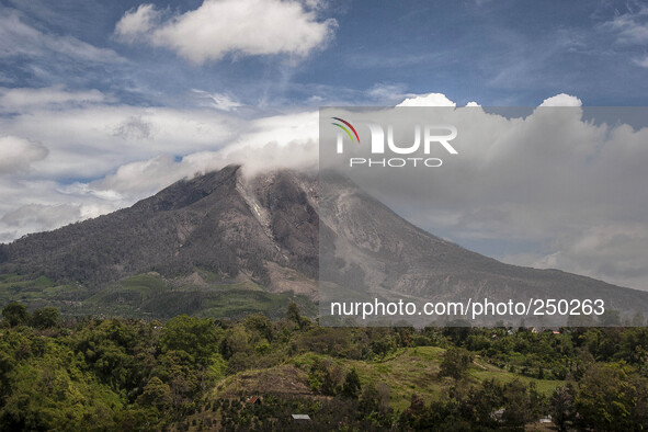 Mount Sinabung seen from Tiga Pancur village, Simpang Empat Distric, Karo, North Sumatera. Indonesia. 15 September 2014. The volcano Mount S...