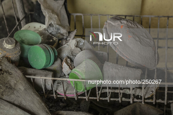 Photo Taken 13 September 2014
A plates and cups in home covered ash volcanic at Gurukinayan village, Simpang Empat Distric, Karo, North Suma...