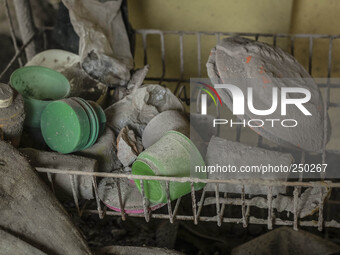 Photo Taken 13 September 2014
A plates and cups in home covered ash volcanic at Gurukinayan village, Simpang Empat Distric, Karo, North Suma...