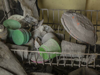 Photo Taken 13 September 2014
A plates and cups in home covered ash volcanic at Gurukinayan village, Simpang Empat Distric, Karo, North Suma...