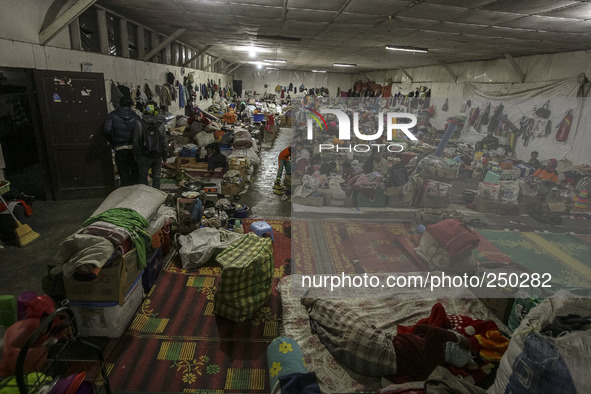 A woman sleep in a refugee camp at Kabanjahe, North Sumatra, Indonesia, on Sept. 11, 2014. The volcano Mount Sinabung has erupted intermitte...