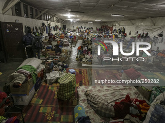 A woman sleep in a refugee camp at Kabanjahe, North Sumatra, Indonesia, on Sept. 11, 2014. The volcano Mount Sinabung has erupted intermitte...