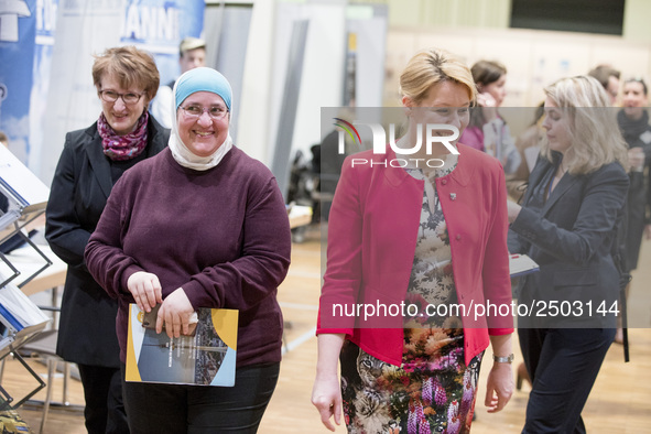 Mayor of Neukoelln Franzisk Giffey (R) attends a Job Fair for Refugees and Migrants in Berlin, Germany on February 20, 2018. With over 200 e...