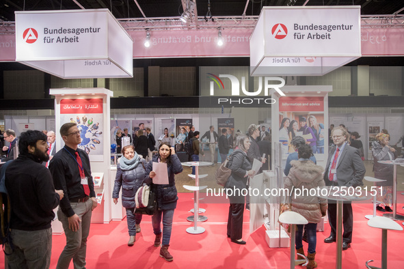 People attend a Job Fair for Refugees and Migrants in Berlin, Germany on February 20, 2018. With over 200 exhibitors and around 3000 job off...