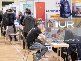 People attend a Job Fair for Refugees and Migrants in Berlin, Germany on February 20, 2018. With over 200 exhibitors and around 3000 job off...