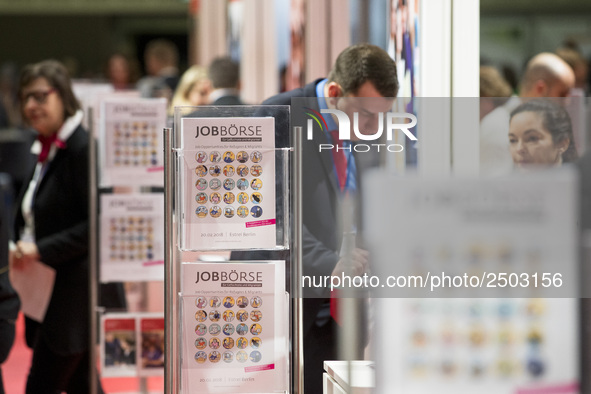 People attend a Job Fair for Refugees and Migrants in Berlin, Germany on February 20, 2018. With over 200 exhibitors and around 3000 job off...