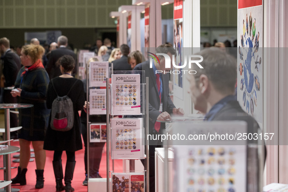 People attend a Job Fair for Refugees and Migrants in Berlin, Germany on February 20, 2018. With over 200 exhibitors and around 3000 job off...