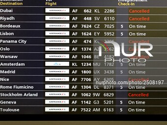 Departure board with Air France cancelled flights during a coordinated one-day strike involving Air France pilots, cabin crew and ground sta...