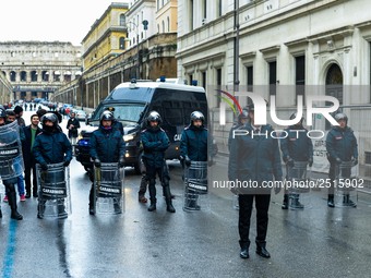 Italian police controls the Logistic and transport workers from COBAS union during a protest against the so-called 'jobs-act' law in Rome, I...