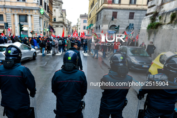 Italian police controls the Logistic and transport workers from COBAS union during a protest against the so-called 'jobs-act' law in Rome, I...