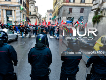 Italian police controls the Logistic and transport workers from COBAS union during a protest against the so-called 'jobs-act' law in Rome, I...