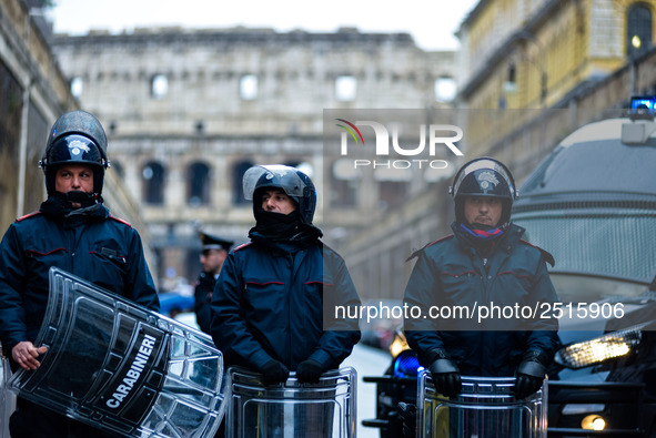 Italian police controls the Logistic and transport workers from COBAS union during a protest against the so-called 'jobs-act' law in Rome, I...