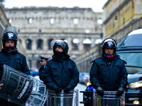 Italian police controls the Logistic and transport workers from COBAS union during a protest against the so-called 'jobs-act' law in Rome, I...