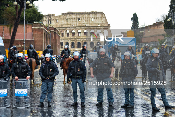 Italian police controls the Logistic and transport workers from COBAS union during a protest against the so-called 'jobs-act' law in Rome, I...