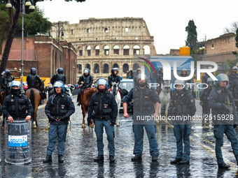 Italian police controls the Logistic and transport workers from COBAS union during a protest against the so-called 'jobs-act' law in Rome, I...