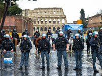 Italian police controls the Logistic and transport workers from COBAS union during a protest against the so-called 'jobs-act' law in Rome, I...