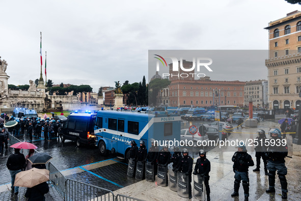 Italian police controls the Logistic and transport workers from COBAS union during a protest against the so-called 'jobs-act' law in Rome, I...