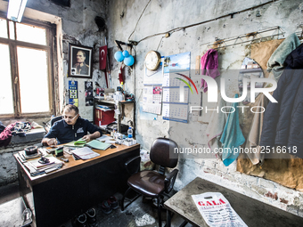 Workers are processing metal to make fasteners for industrial use in a old "han" factory in Istanbul, Turkey, 25 February 2018. This buildin...