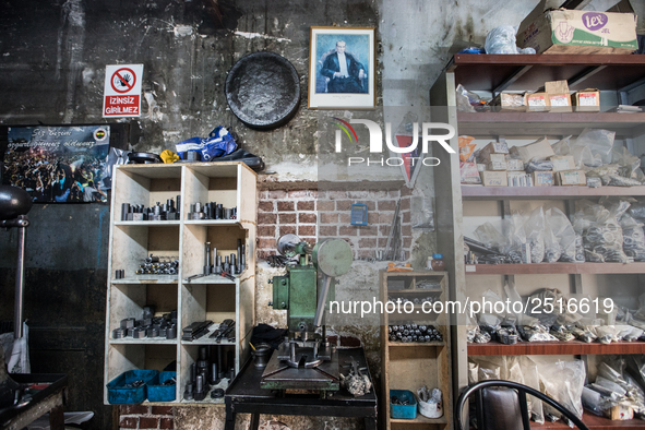 Workers are processing metal to make fasteners for industrial use in a old "han" factory in Istanbul, Turkey, 25 February 2018. This buildin...