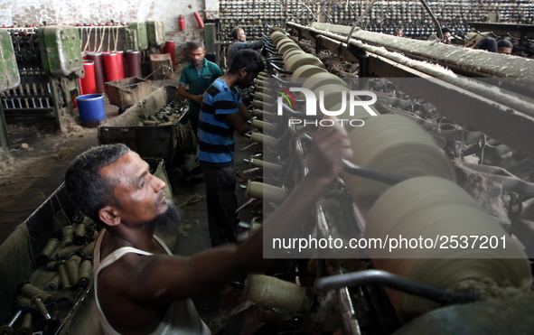 Workers busy in making jute sacks at Latif Bawany Jute Mills in Demra, Dhaka, on 5 March 2018 amid the country is ready to celebrate Nationa...