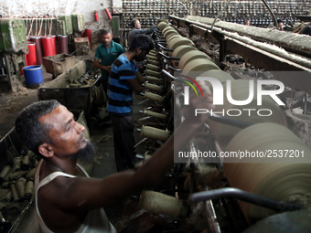 Workers busy in making jute sacks at Latif Bawany Jute Mills in Demra, Dhaka, on 5 March 2018 amid the country is ready to celebrate Nationa...