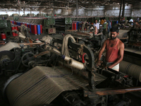 Workers busy in making jute sacks at Latif Bawany Jute Mills in Demra, Dhaka, on 5 March 2018 amid the country is ready to celebrate Nationa...