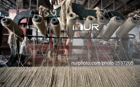 Workers busy in making jute sacks at Latif Bawany Jute Mills in Demra, Dhaka, on 5 March 2018 amid the country is ready to celebrate Nationa...