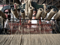 Workers busy in making jute sacks at Latif Bawany Jute Mills in Demra, Dhaka, on 5 March 2018 amid the country is ready to celebrate Nationa...