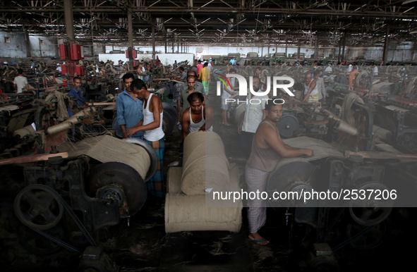 Workers busy in making jute sacks at Latif Bawany Jute Mills in Demra, Dhaka, on 5 March 2018 amid the country is ready to celebrate Nationa...