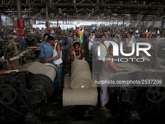 Workers busy in making jute sacks at Latif Bawany Jute Mills in Demra, Dhaka, on 5 March 2018 amid the country is ready to celebrate Nationa...