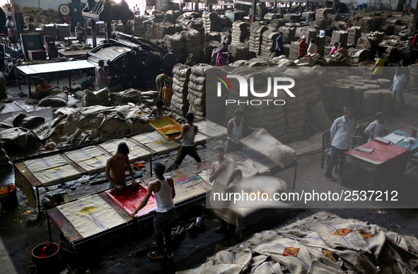 Workers busy in making jute sacks at Latif Bawany Jute Mills in Demra, Dhaka, on 5 March 2018 amid the country is ready to celebrate Nationa...