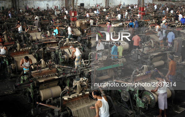 Workers busy in making jute sacks at Latif Bawany Jute Mills in Demra, Dhaka, on 5 March 2018 amid the country is ready to celebrate Nationa...