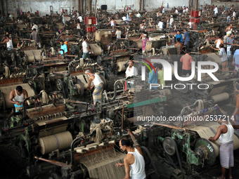 Workers busy in making jute sacks at Latif Bawany Jute Mills in Demra, Dhaka, on 5 March 2018 amid the country is ready to celebrate Nationa...