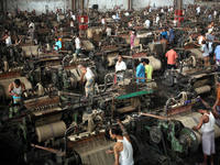 Workers busy in making jute sacks at Latif Bawany Jute Mills in Demra, Dhaka, on 5 March 2018 amid the country is ready to celebrate Nationa...