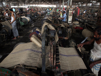 Workers busy in making jute sacks at Latif Bawany Jute Mills in Demra, Dhaka, on 5 March 2018 amid the country is ready to celebrate Nationa...