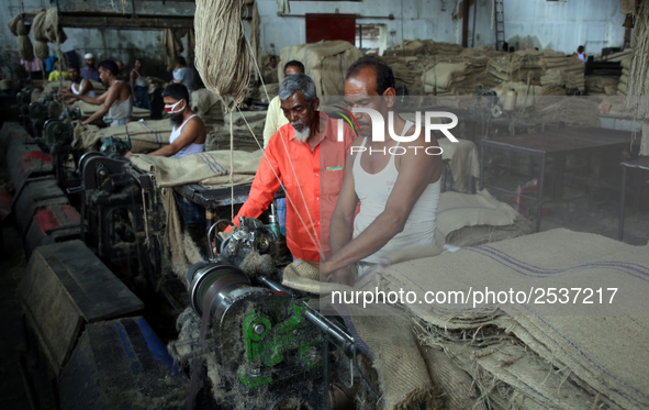 Workers busy in making jute sacks at Latif Bawany Jute Mills in Demra, Dhaka, on 5 March 2018 amid the country is ready to celebrate Nationa...