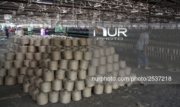 Workers busy in making jute sacks at Latif Bawany Jute Mills in Demra, Dhaka, on 5 March 2018 amid the country is ready to celebrate Nationa...