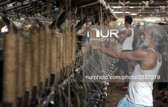 Workers busy in making jute sacks at Latif Bawany Jute Mills in Demra, Dhaka, on 5 March 2018 amid the country is ready to celebrate Nationa...