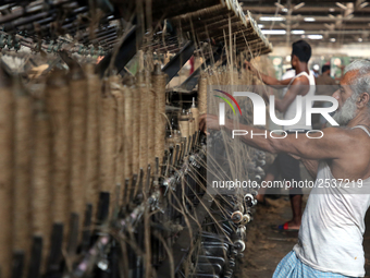 Workers busy in making jute sacks at Latif Bawany Jute Mills in Demra, Dhaka, on 5 March 2018 amid the country is ready to celebrate Nationa...