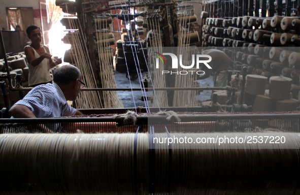 Workers busy in making jute sacks at Latif Bawany Jute Mills in Demra, Dhaka, on 5 March 2018 amid the country is ready to celebrate Nationa...