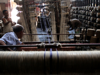 Workers busy in making jute sacks at Latif Bawany Jute Mills in Demra, Dhaka, on 5 March 2018 amid the country is ready to celebrate Nationa...