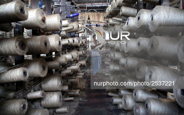 Workers busy in making jute sacks at Latif Bawany Jute Mills in Demra, Dhaka, on 5 March 2018 amid the country is ready to celebrate Nationa...