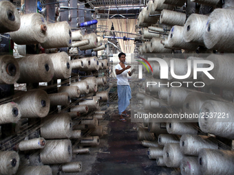 Workers busy in making jute sacks at Latif Bawany Jute Mills in Demra, Dhaka, on 5 March 2018 amid the country is ready to celebrate Nationa...